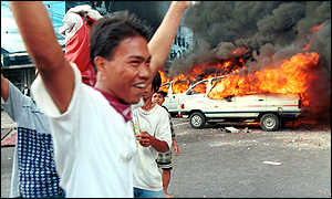 _219525_Rioting_youths_300[1].jpg (14032 bytes)